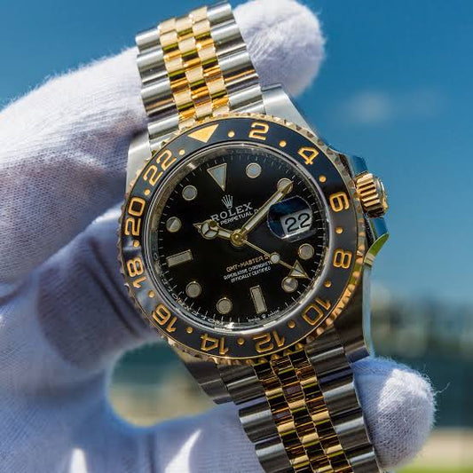 LUXER ROLEX  GMT GOLD    BLCK TWO TONE EDITION. WATCH
